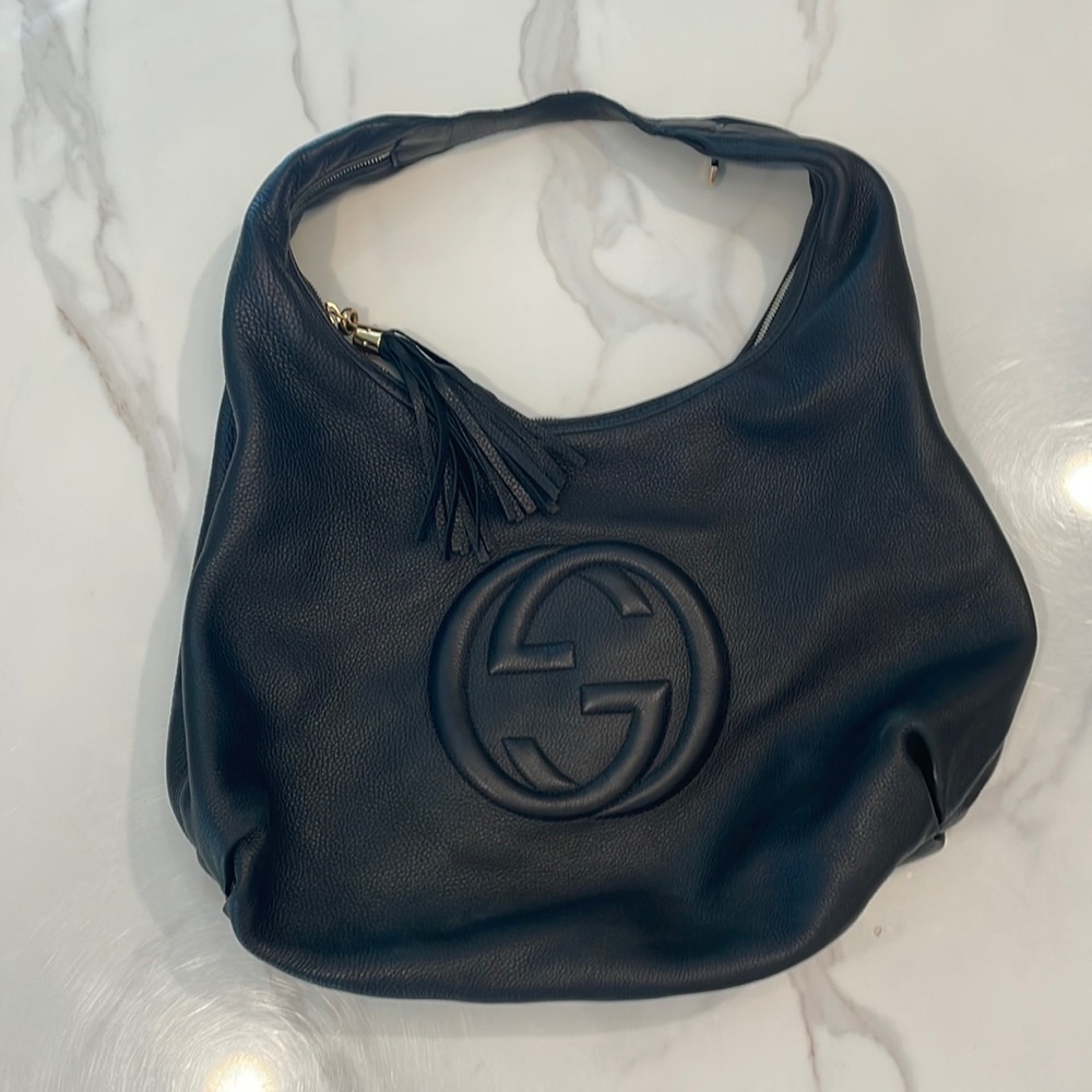 Gucci leather black shoulder hobo style shoulder back with tassel zipper